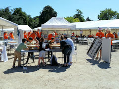 Orange-shirted helpers